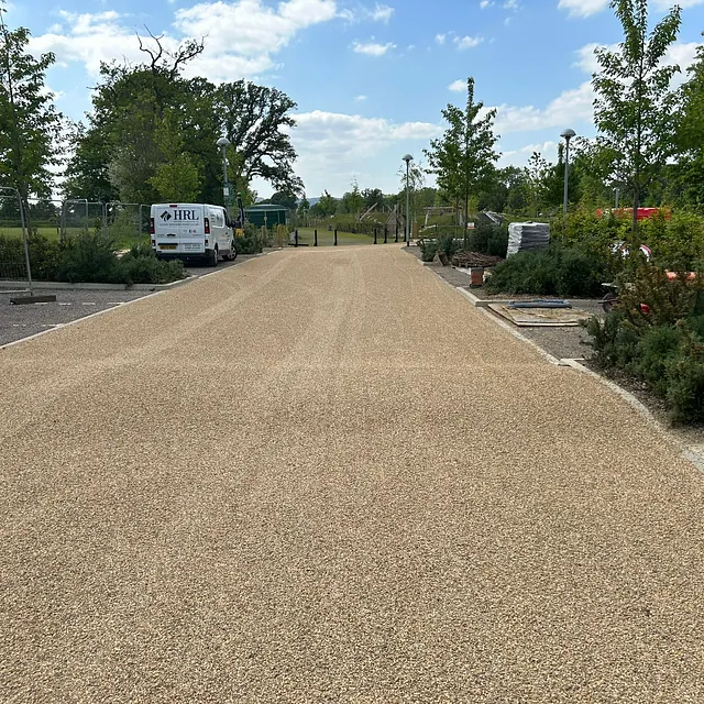 Car park resurfacing using hot bitumen and golden gravel